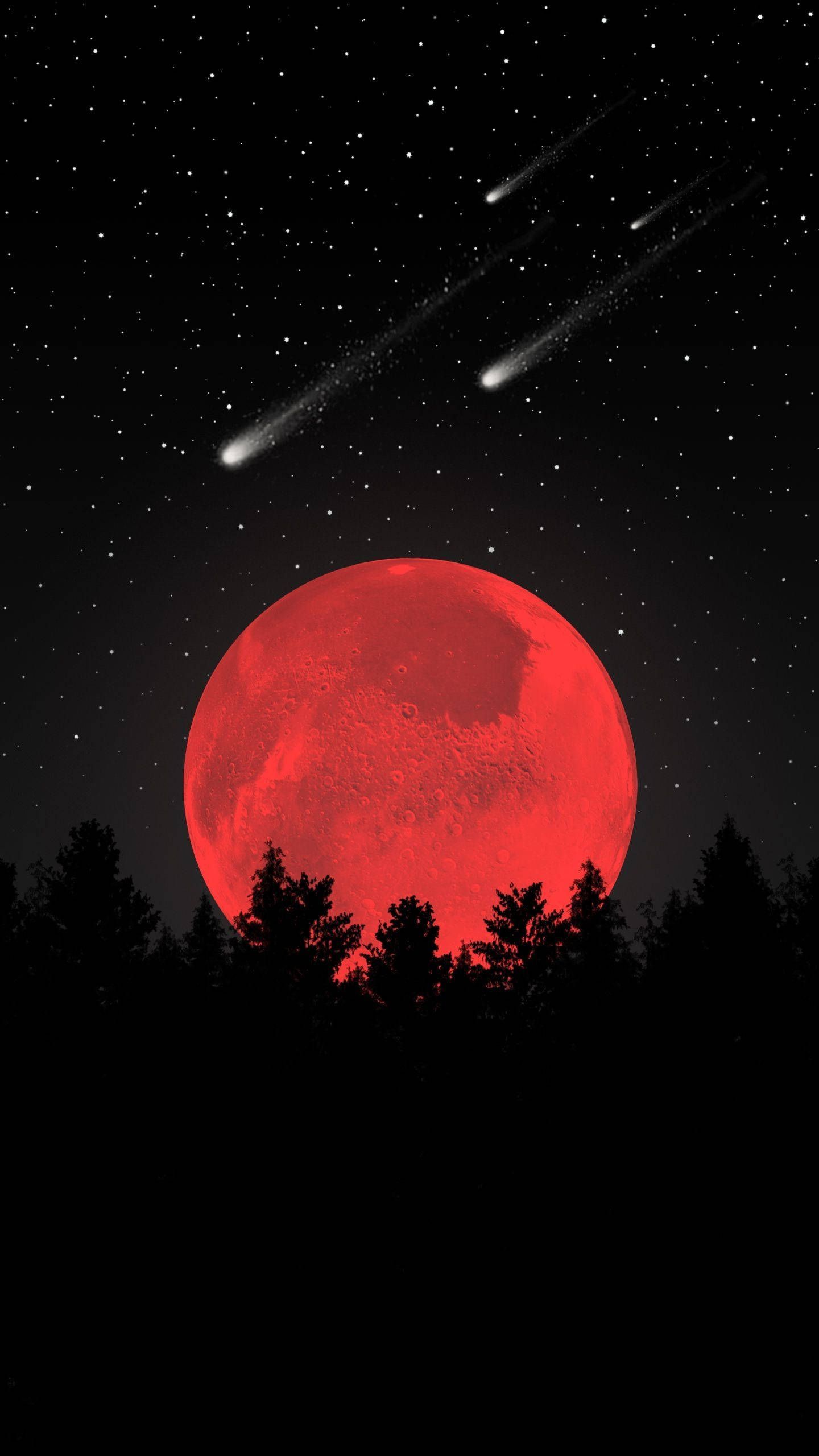 A red moon with stars and trees in the background - Moon