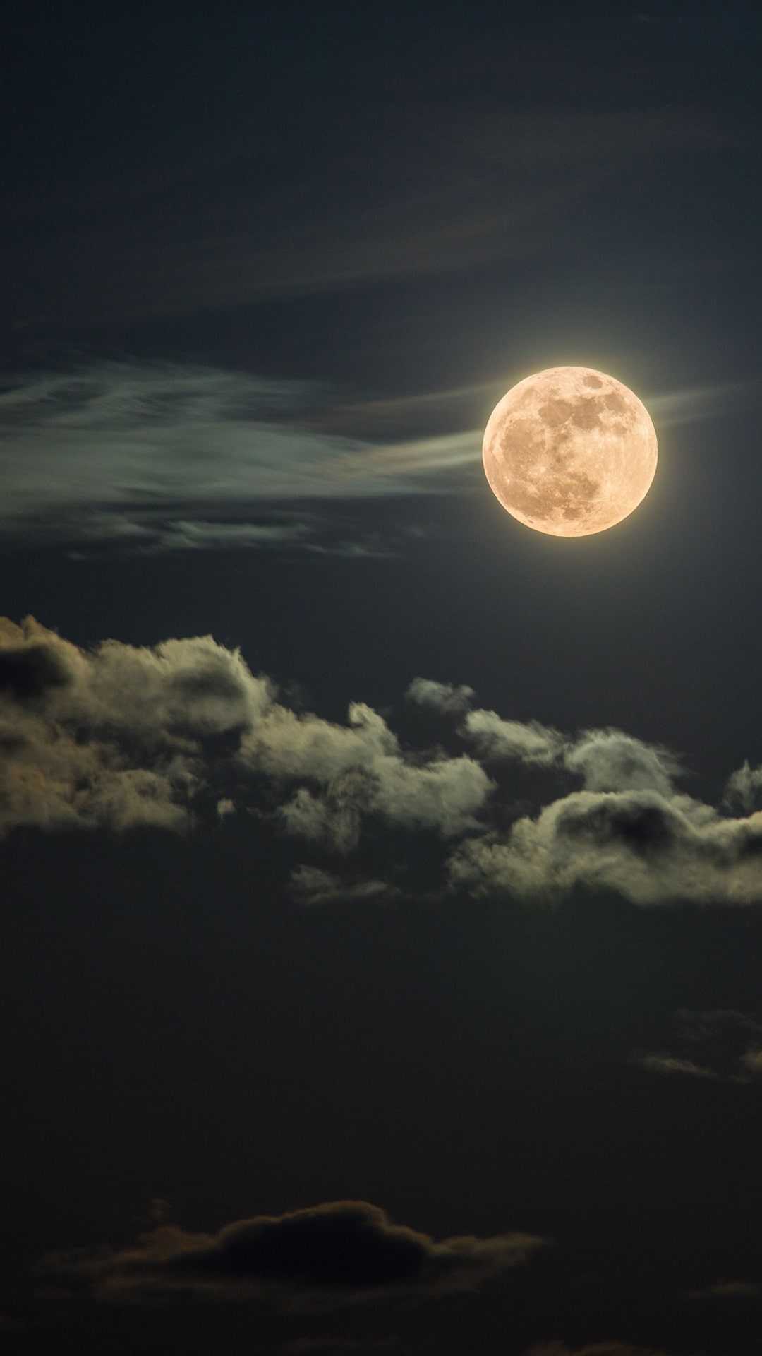 IPhone wallpaper of the full moon with clouds in the night sky. - Moon