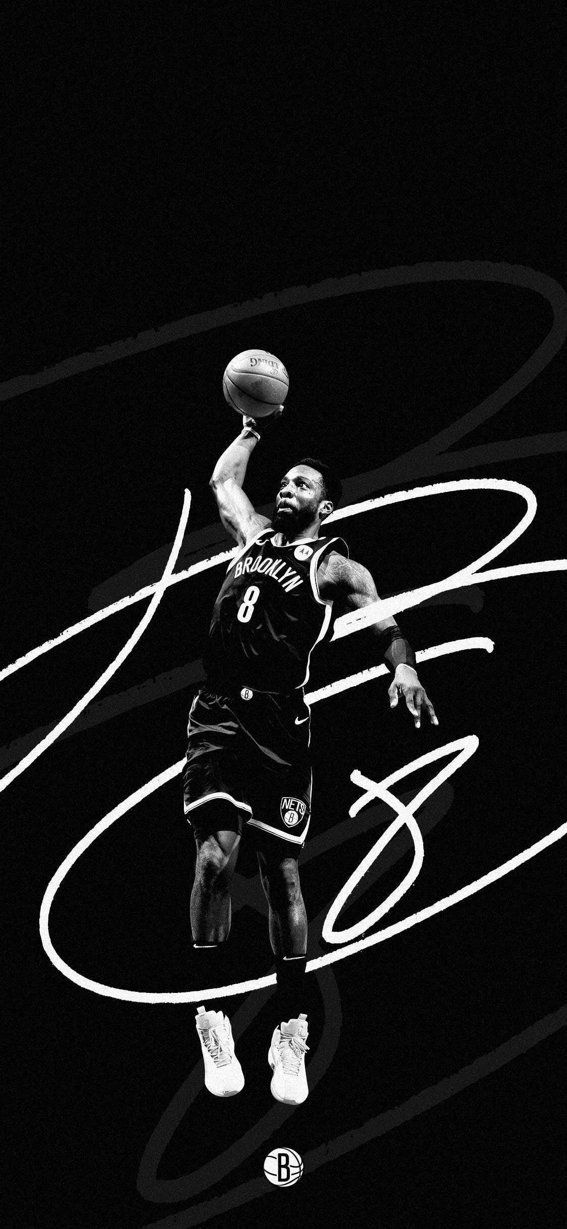 A black and white photo of an athlete in action - Basketball