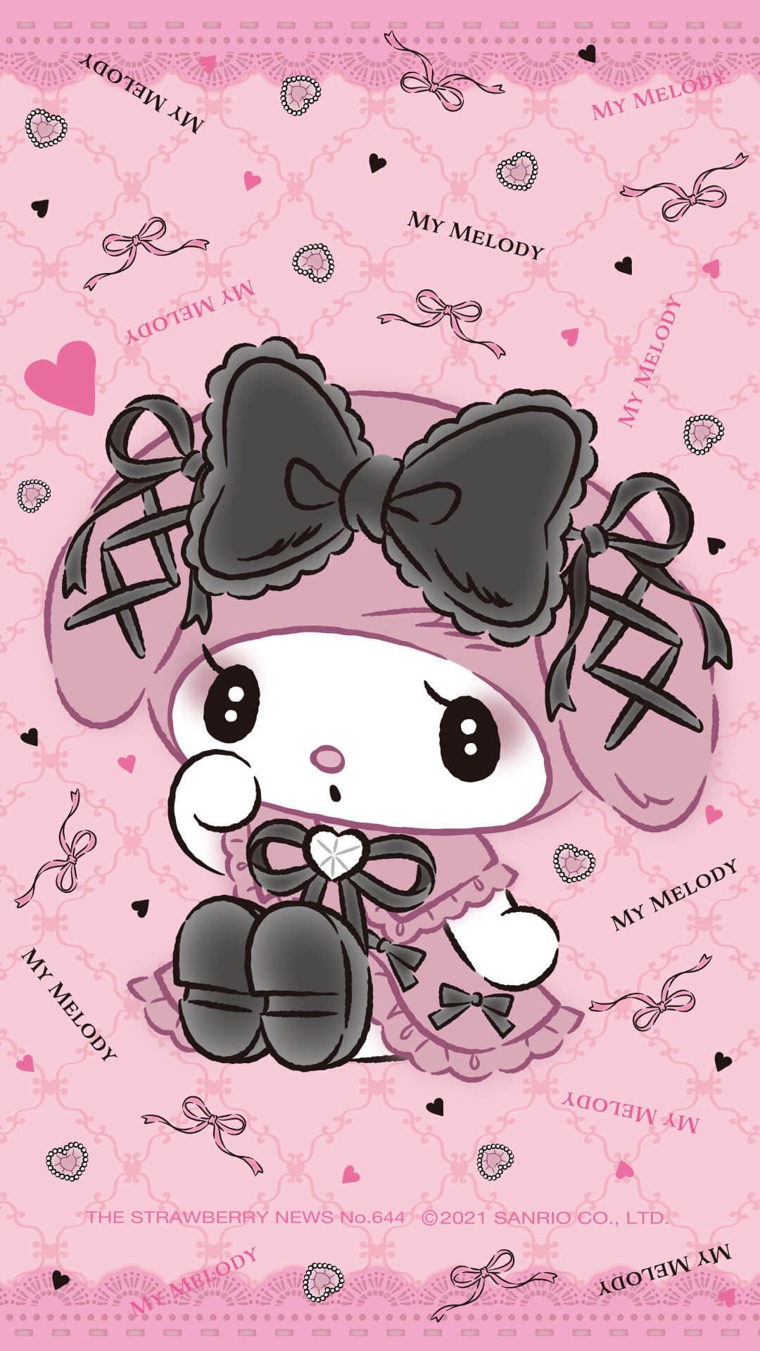 A cute little girl in pink dress with bow - Kuromi
