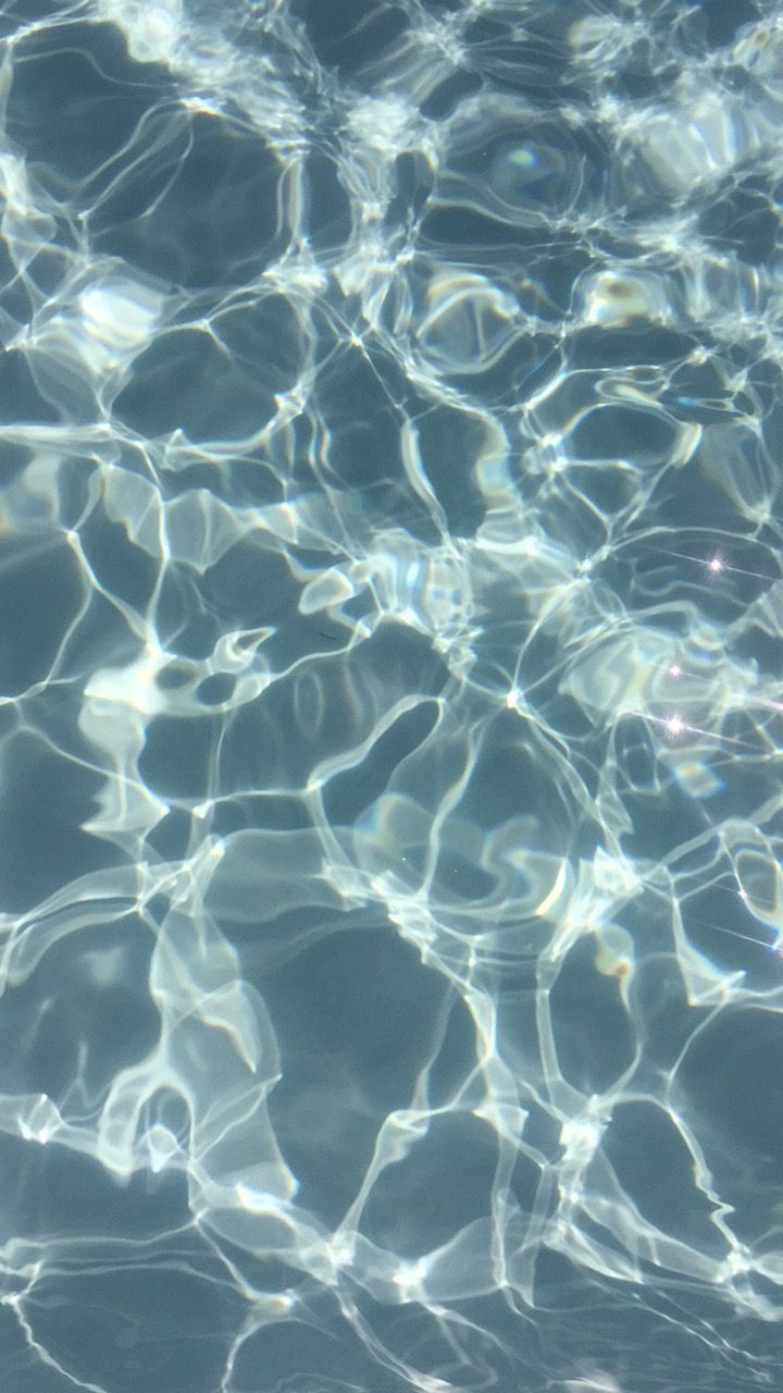 A close up of water in the pool - Water