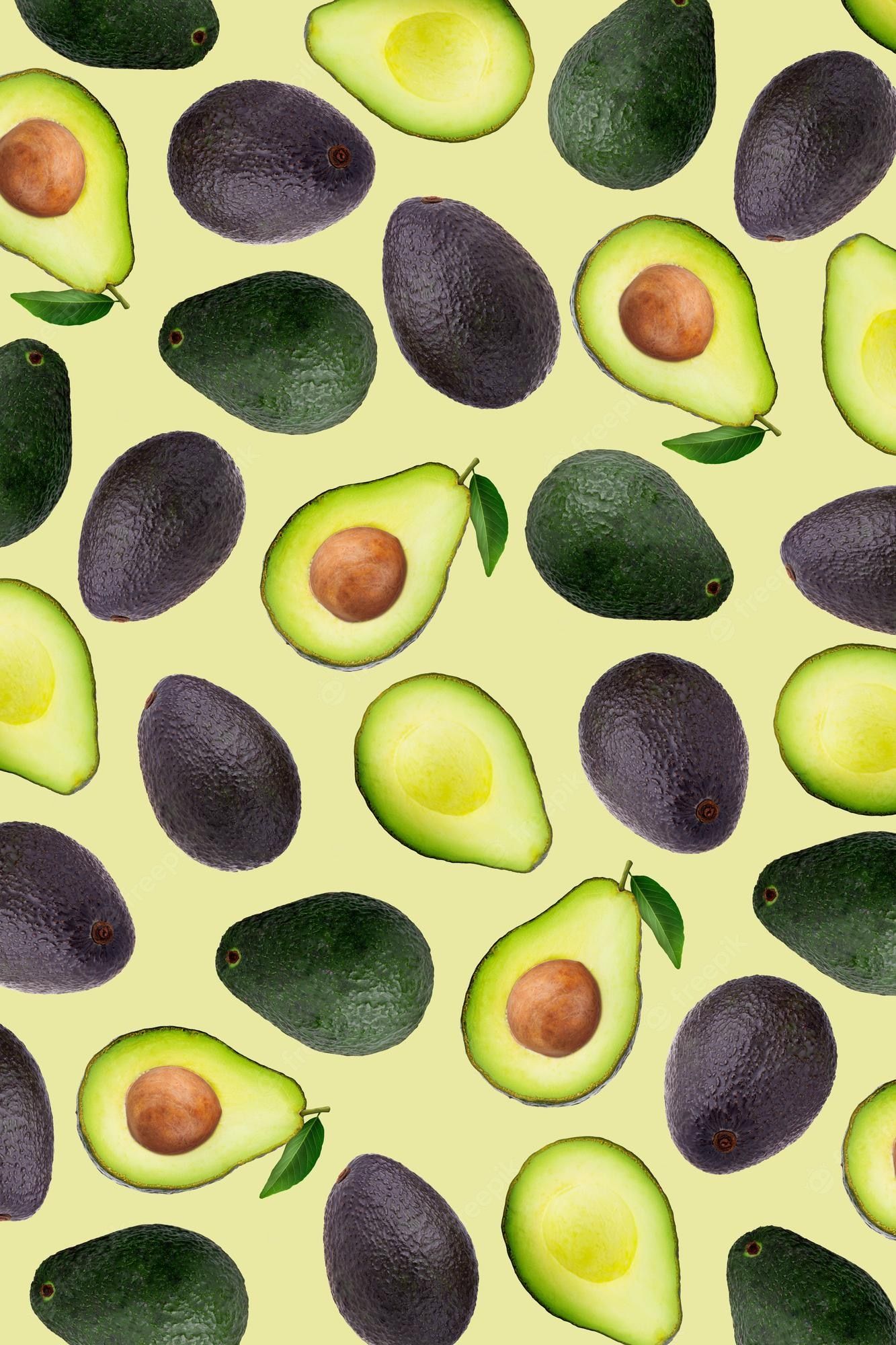 A pattern of avocados on yellow background - Avocado