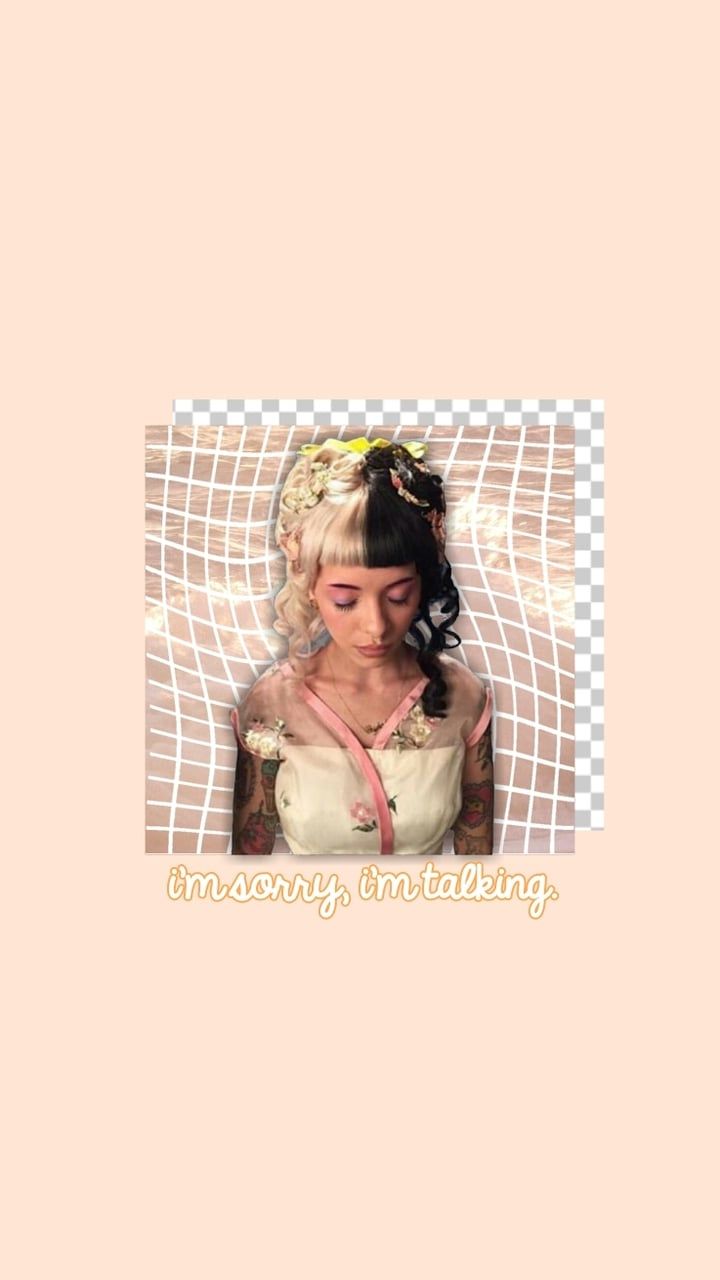 A woman with tattoos and piercings on her face. - Peach, Melanie Martinez