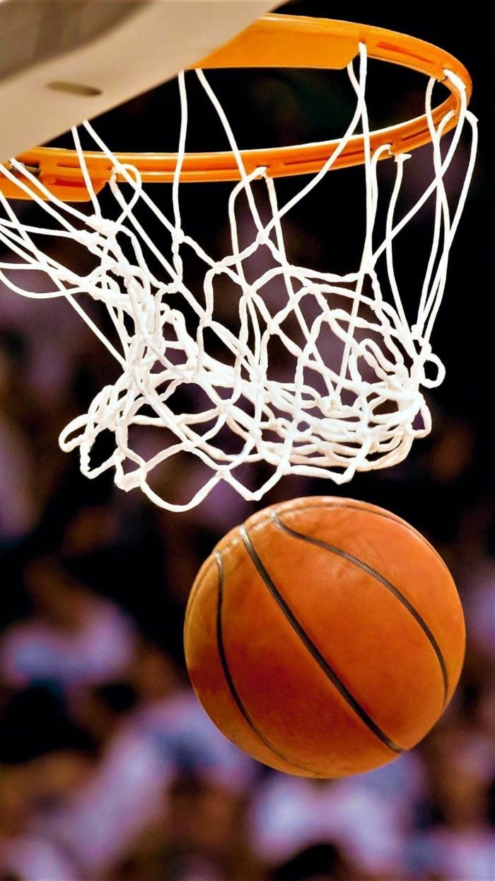 A basketball is going through the hoop - Basketball, NBA