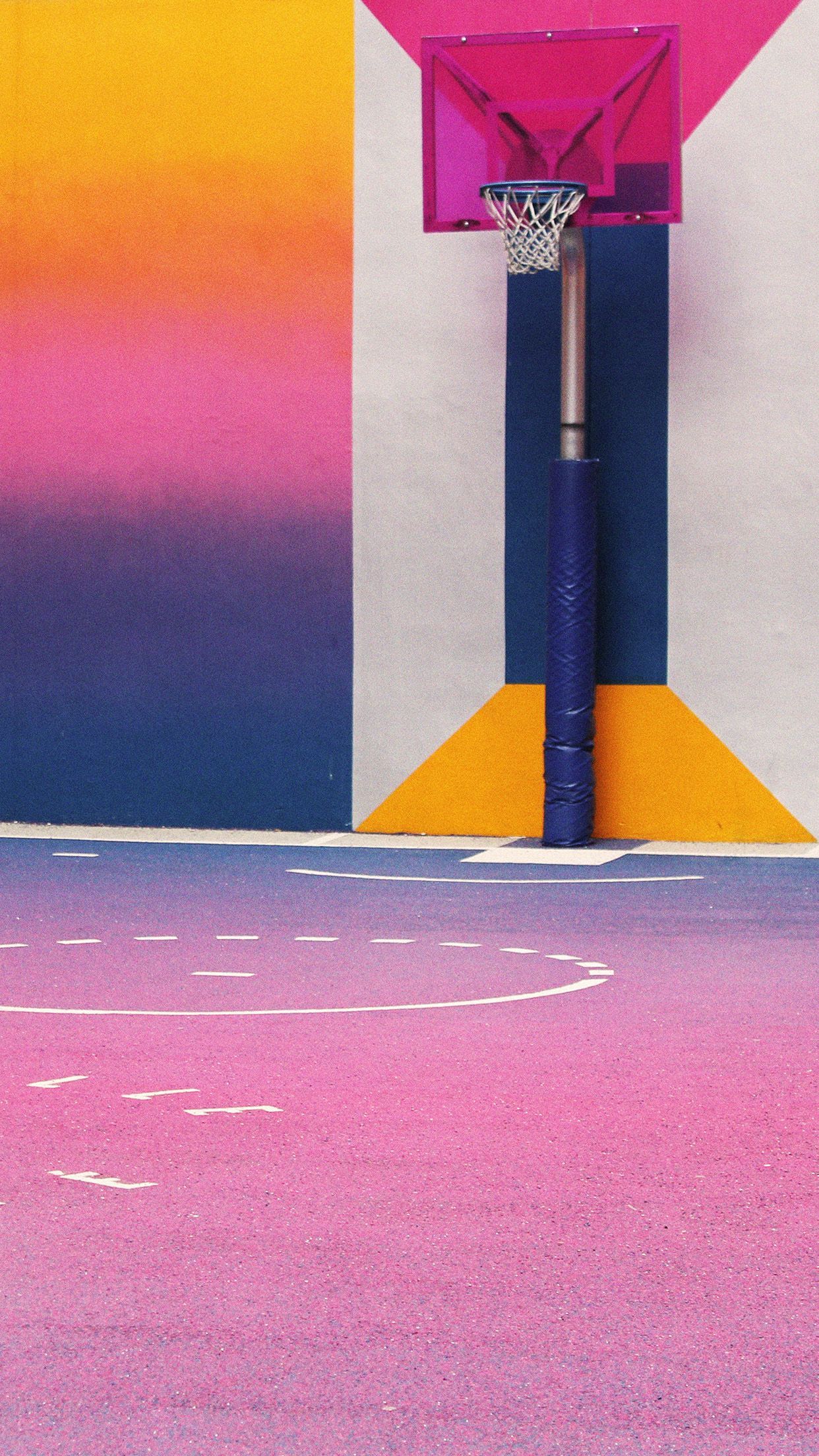 A basketball hoop with a colorful background - Basketball
