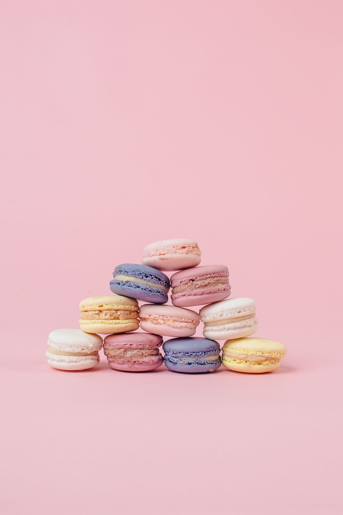 Browse Free HD Image of Pastel Macaron Pyramid On Pink Portrait