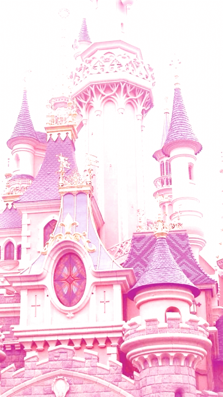 A pink castle with turrets and a clock. - Castle