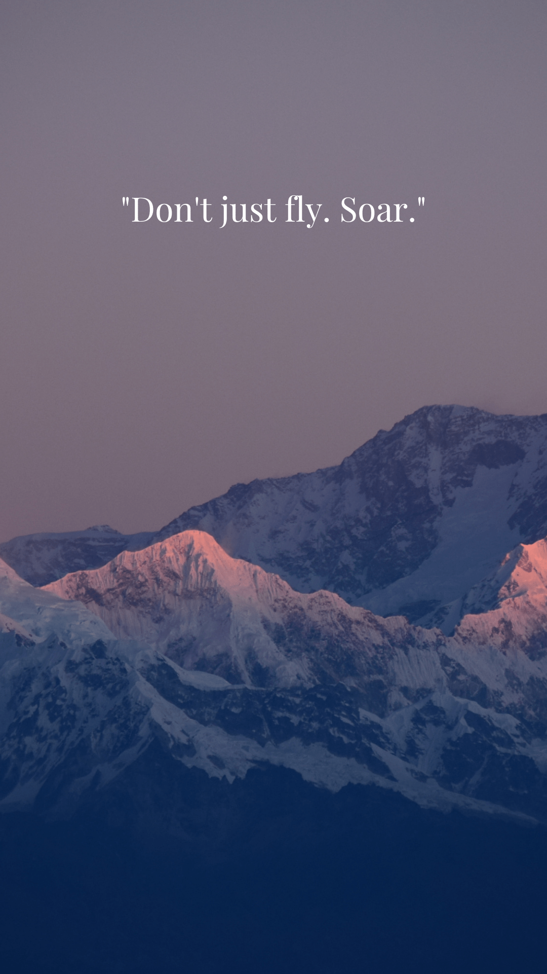 A mountain range with the words don't just fly, soar - Nature