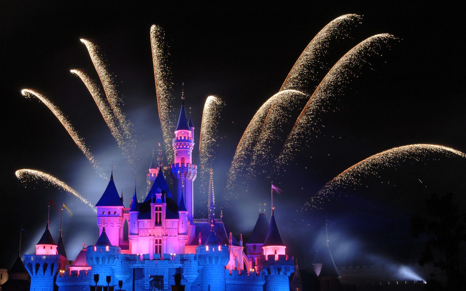 Fireworks light up the sky over Sleeping Beauty's castle at Disneyland in Hong Kong. - Disneyland