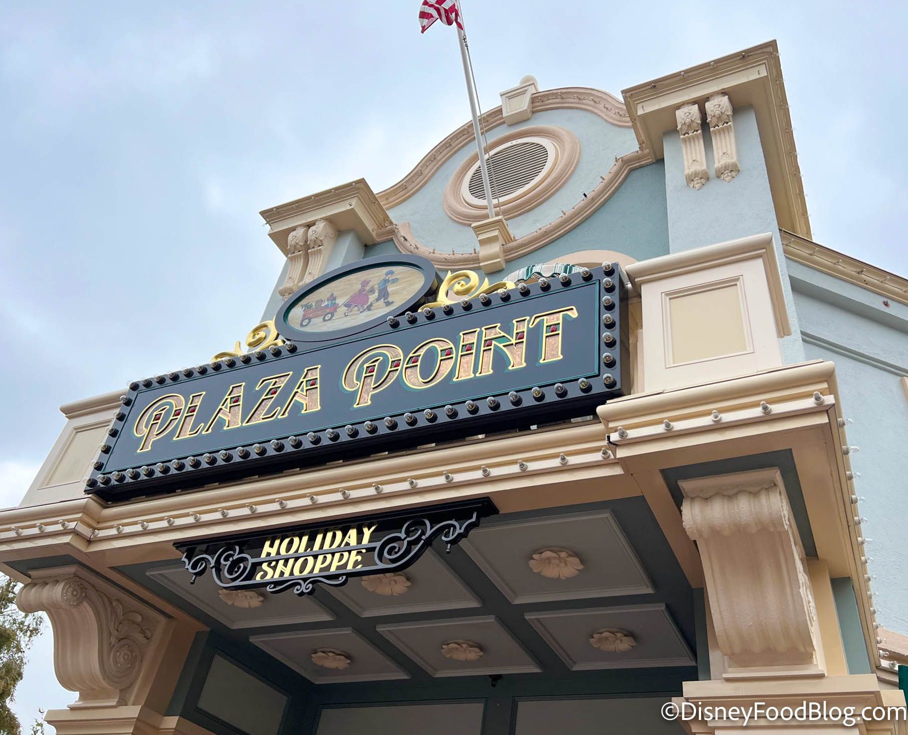 A building with the name plaza point on it - Disneyland