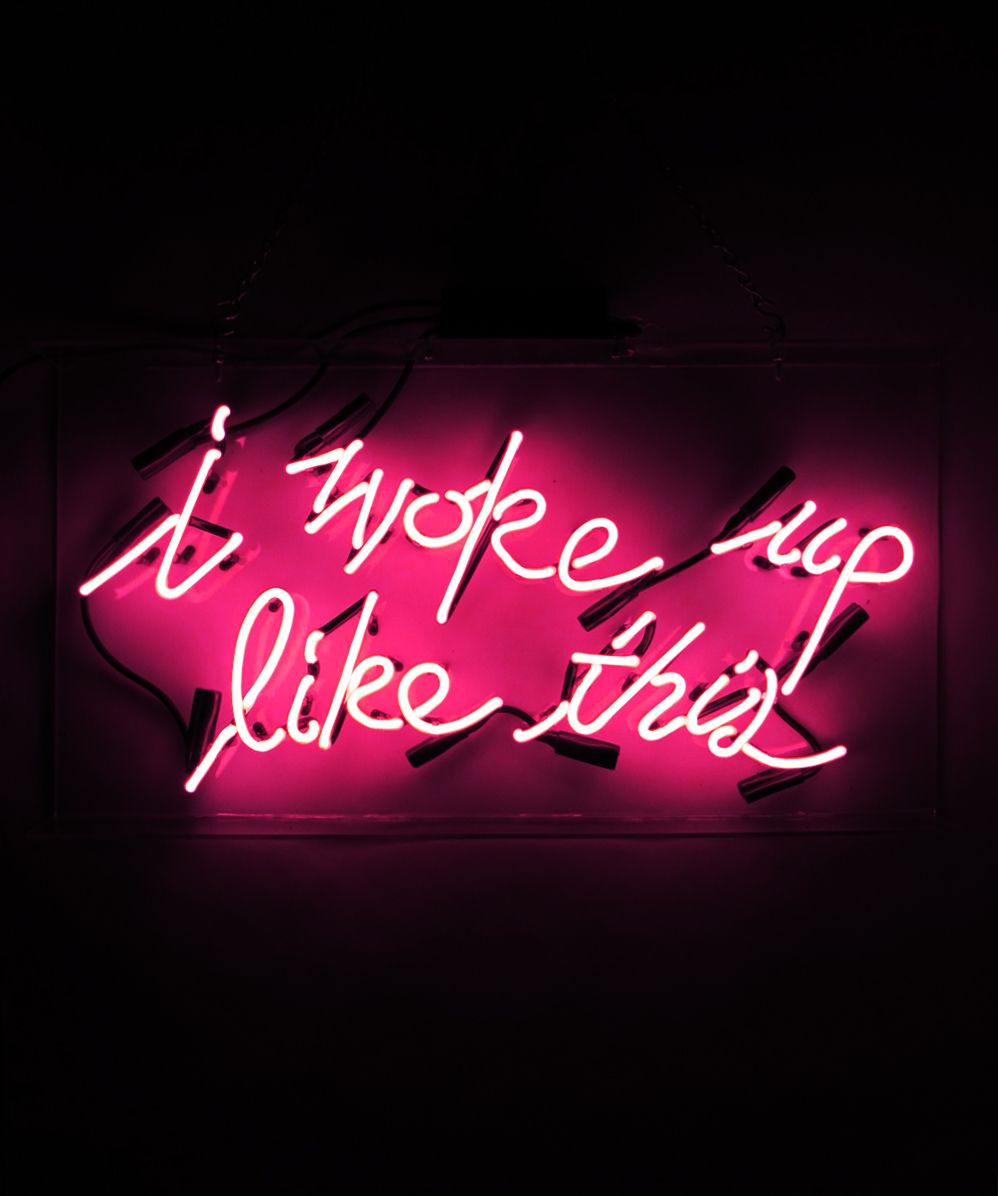 A neon sign that says 