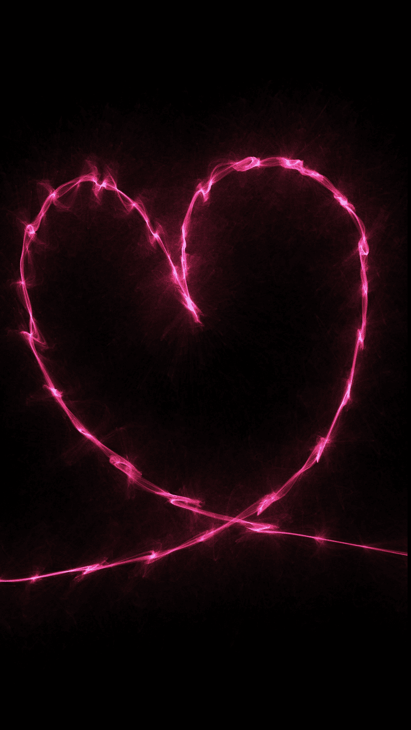 A heart shaped light on the dark background - Neon pink