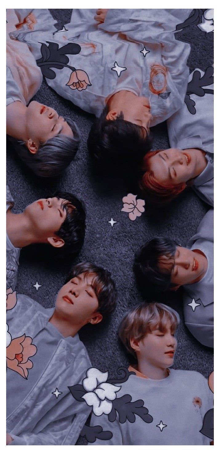 A poster with several people laying on the ground - BTS