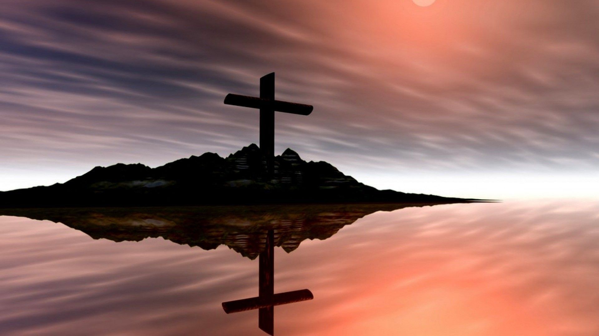 The cross of Jesus on a hill reflected in water - Cross