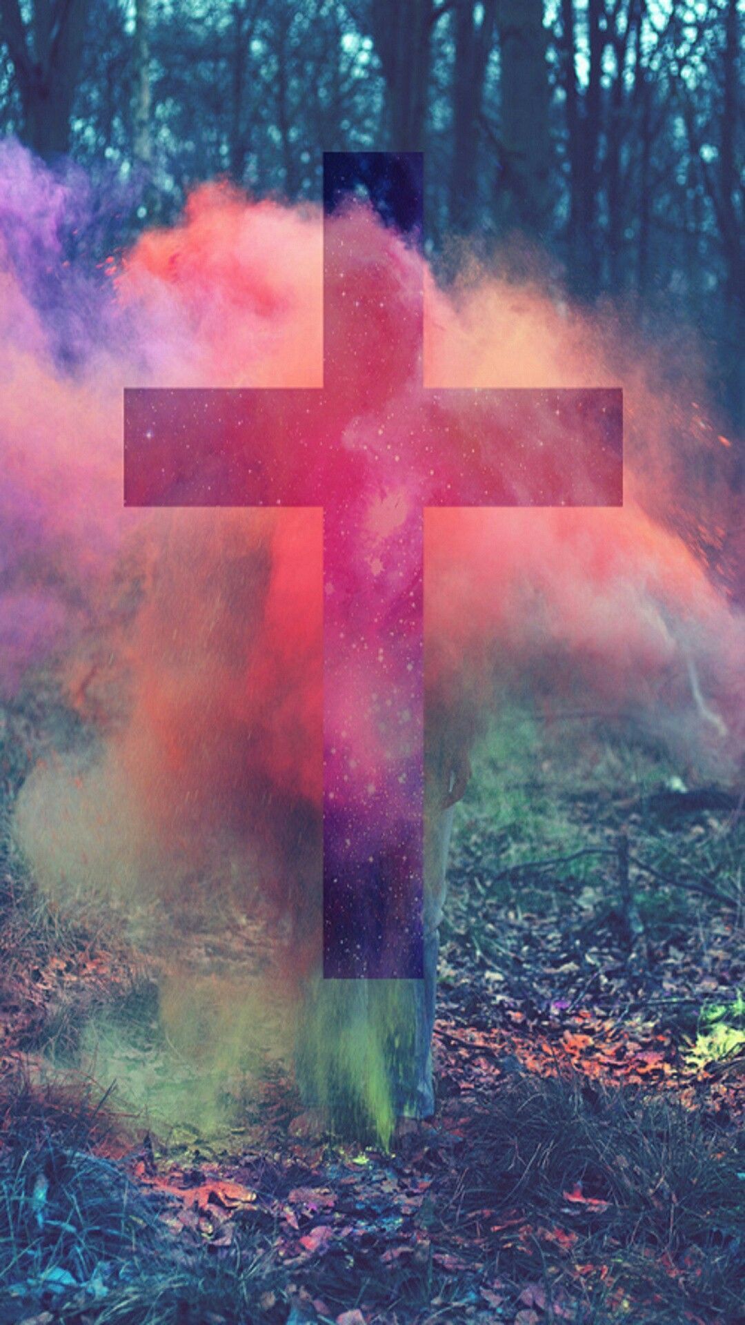 A cross is in the middle of some colored smoke - Cross