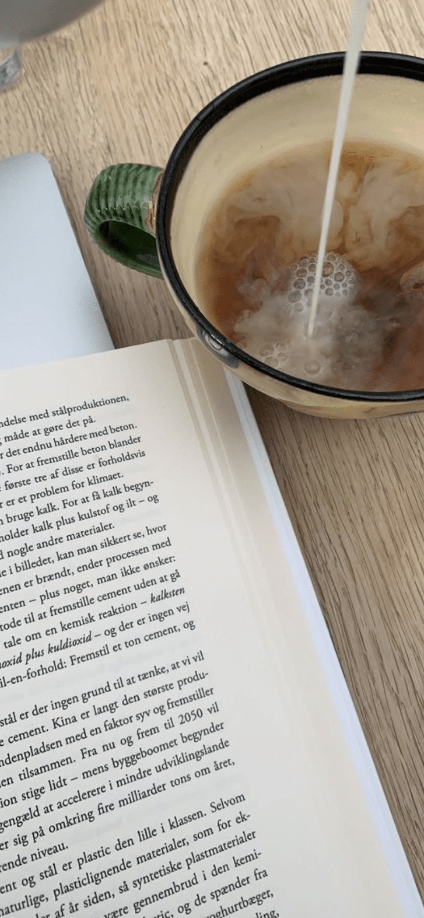 A book is open and there are cups of coffee - Coffee