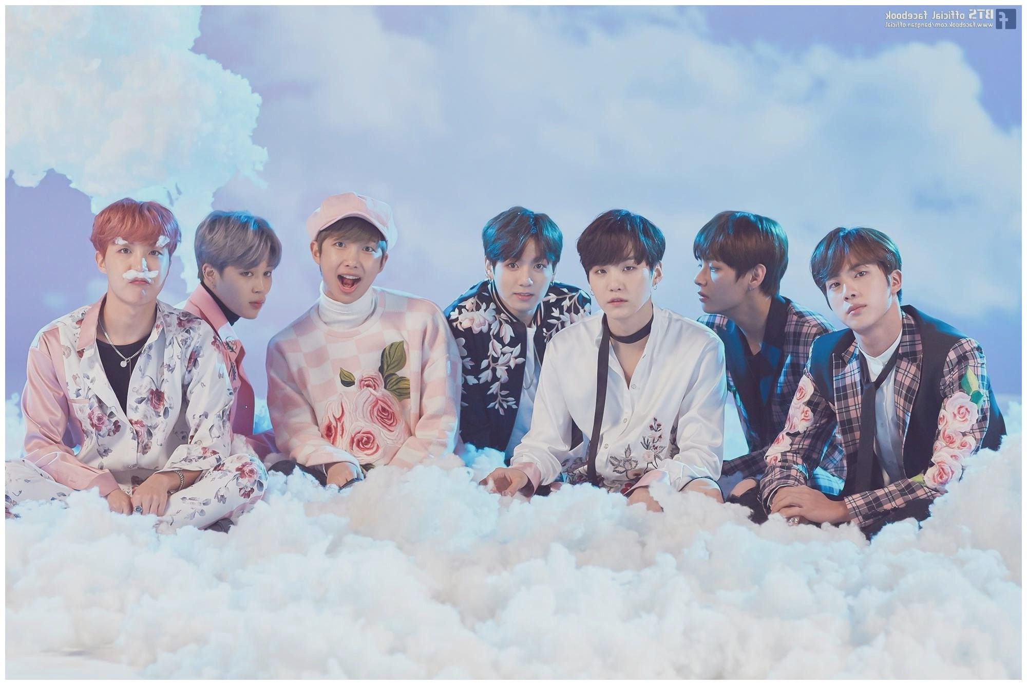 The group of BTS members sitting on a pile of clouds - BTS
