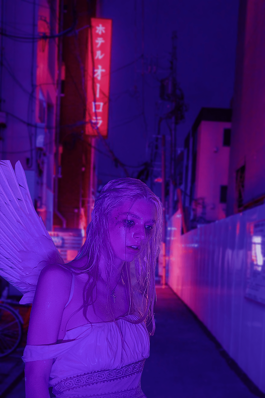 A woman with white wings and purple lighting - Euphoria