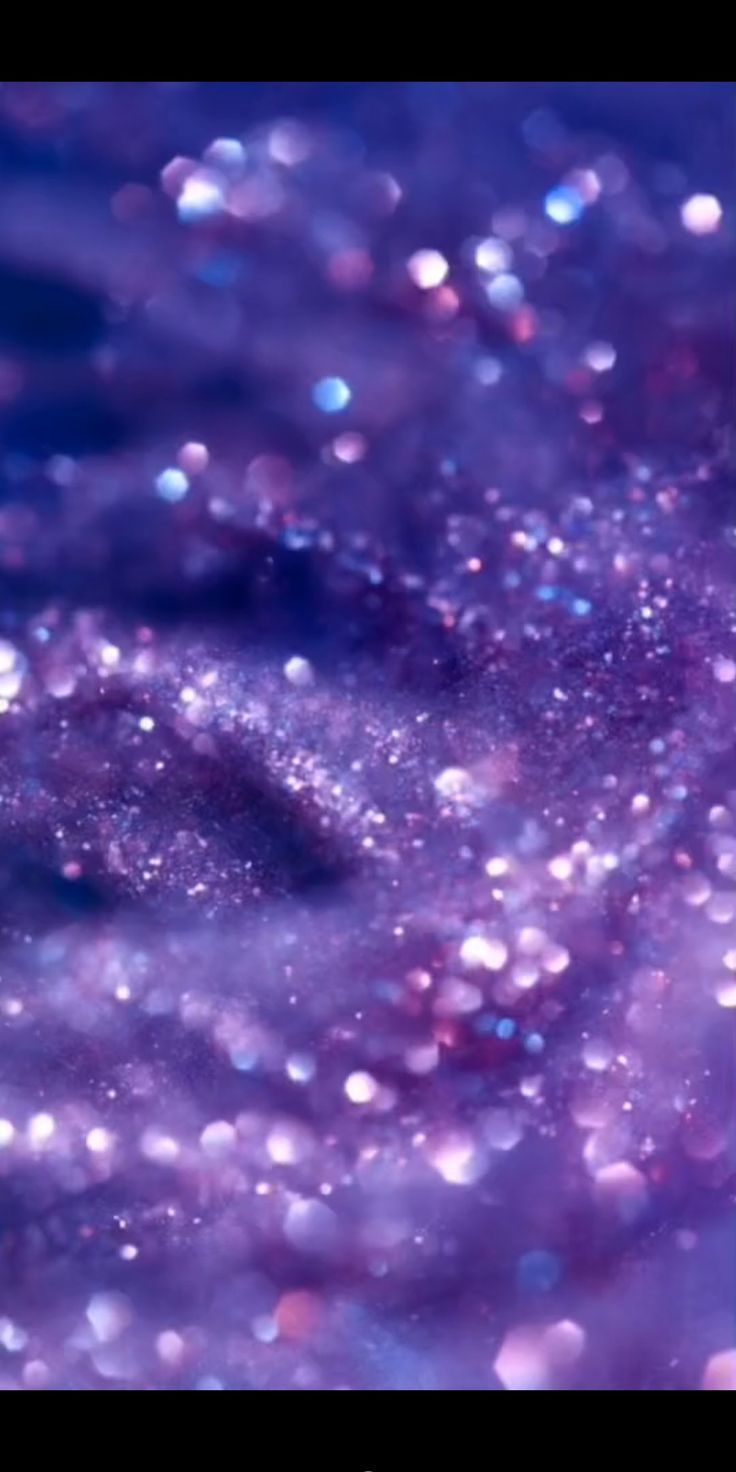 A purple background with sparkling glitter - Euphoria