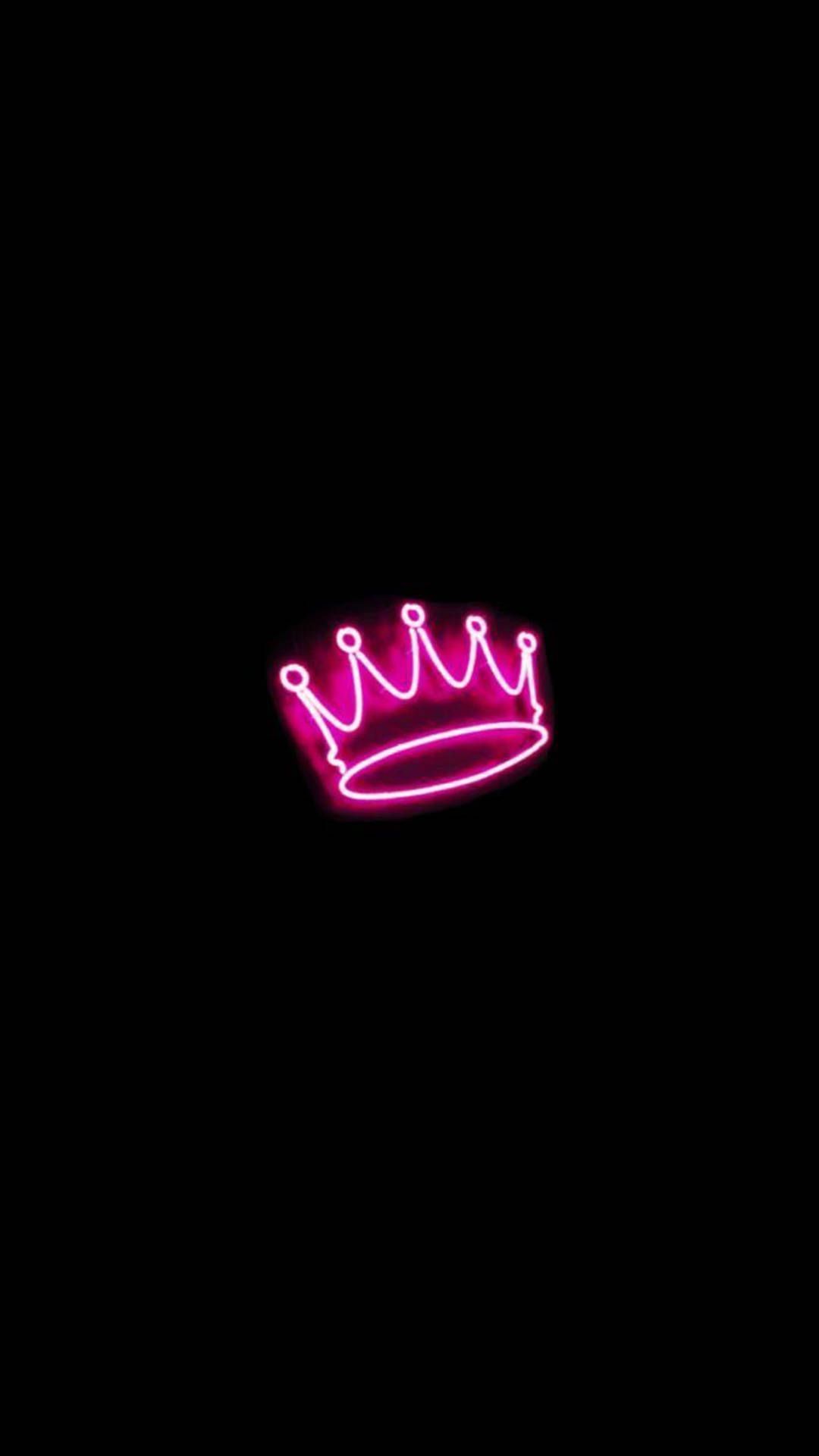 A neon pink crown on black background - Hot pink, crown