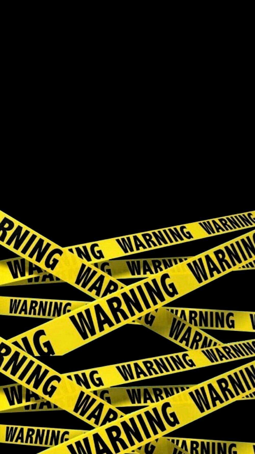 A yellow warning tape is on the black background - Funny
