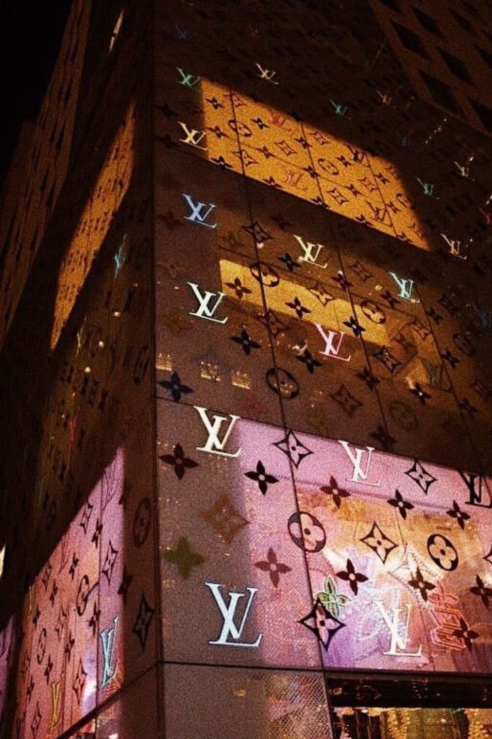 A building with louis vuitton logos on it - Louis Vuitton