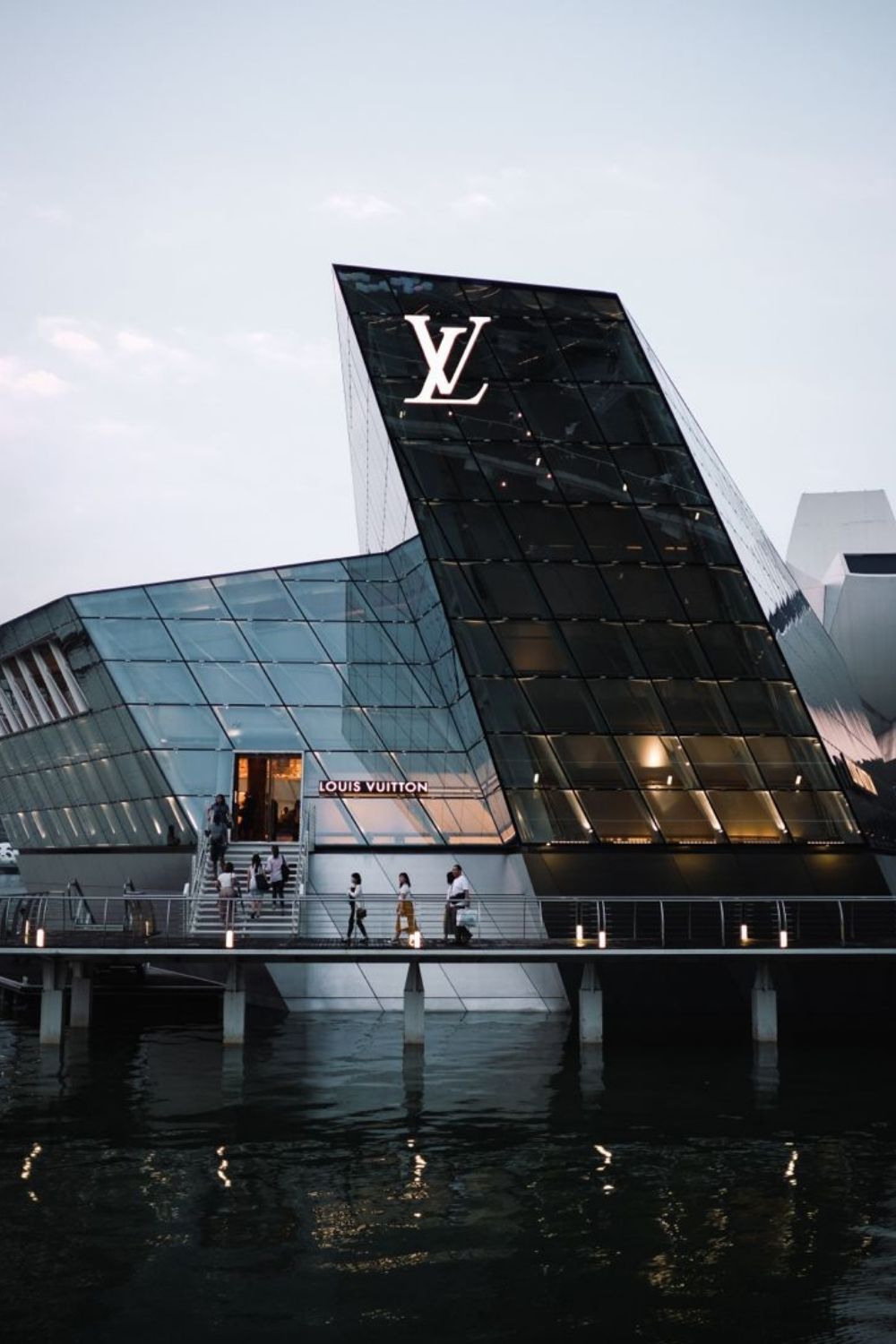 A building with the lv logo on it - Louis Vuitton