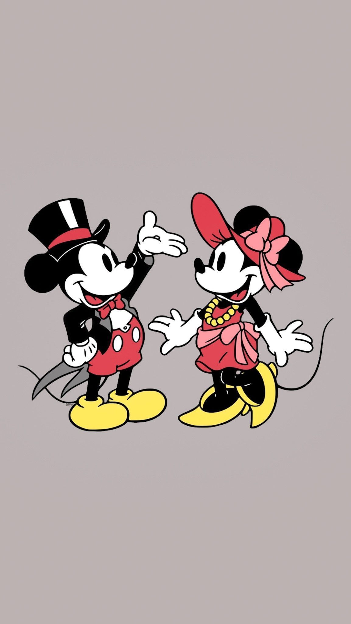 A cartoon of two mickey mouse characters - Mickey Mouse, Minnie Mouse