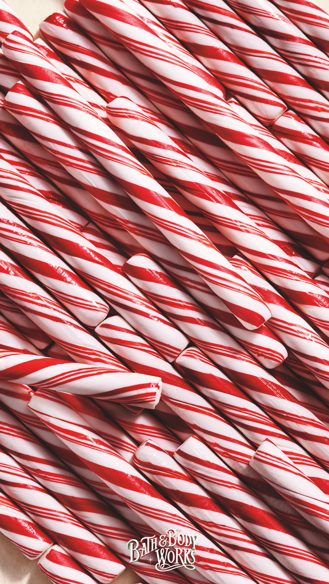 A pile of red and white candy canes. - Candy cane