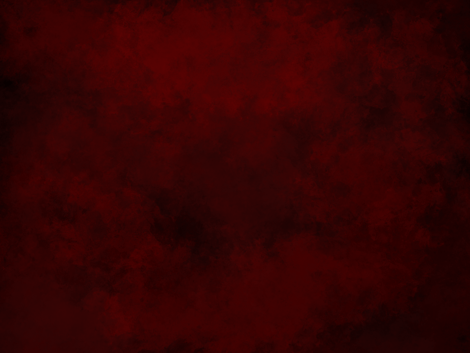 A red background with some black spots - Crimson