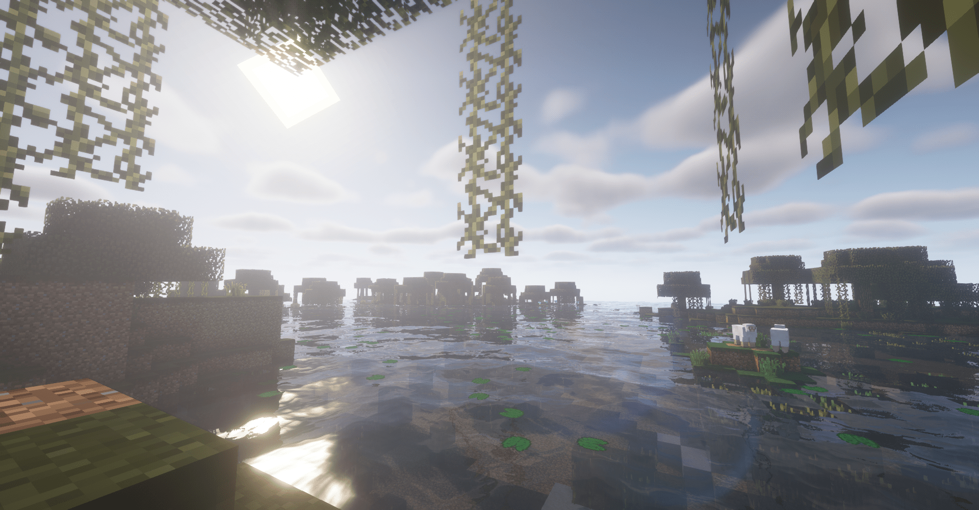 A Minecraft screenshot of a landscape with water, trees, and sky. - Minecraft