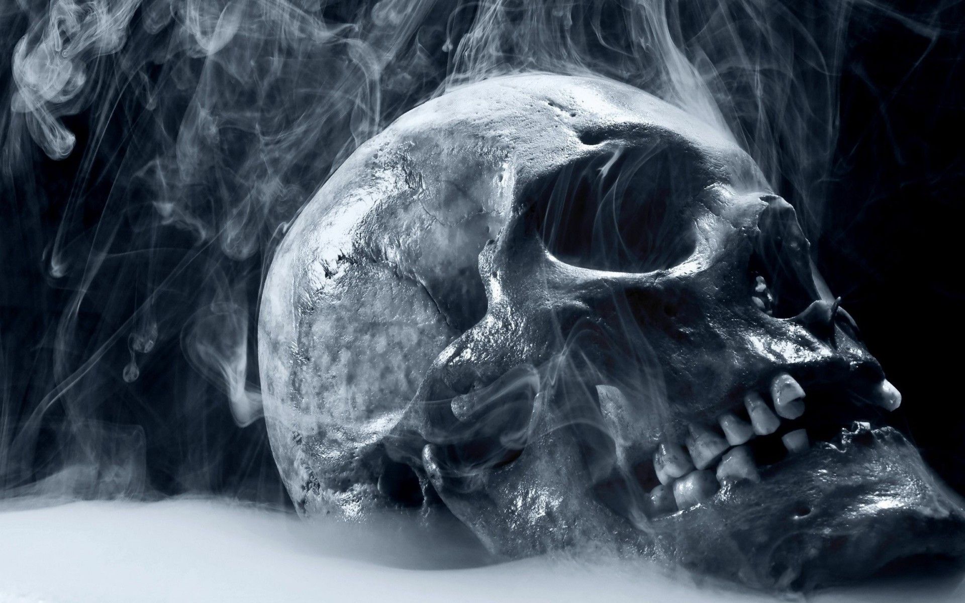 A skull with smoke coming out of it - Skull