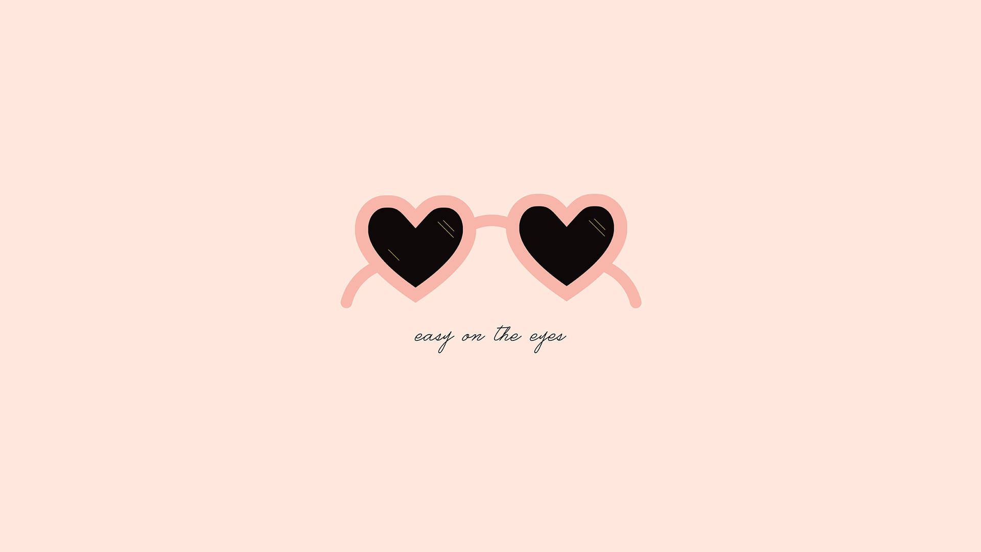 A pink heart with black hearts on it - February