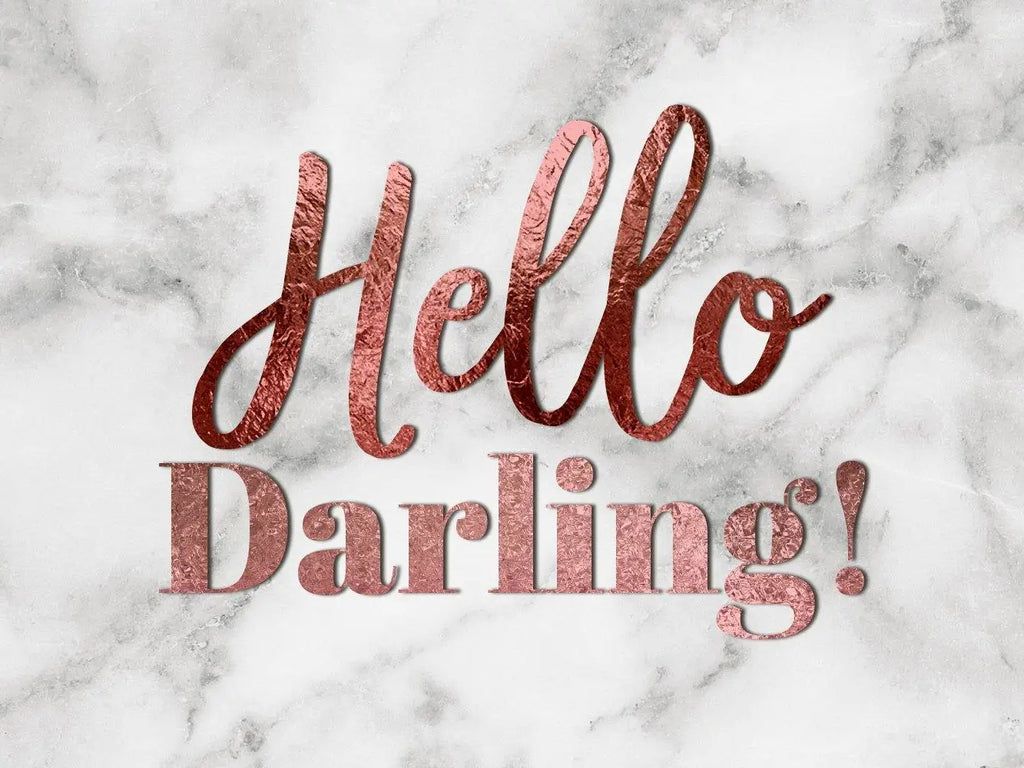A marble background with the words hello darling written in rose gold - Rose gold