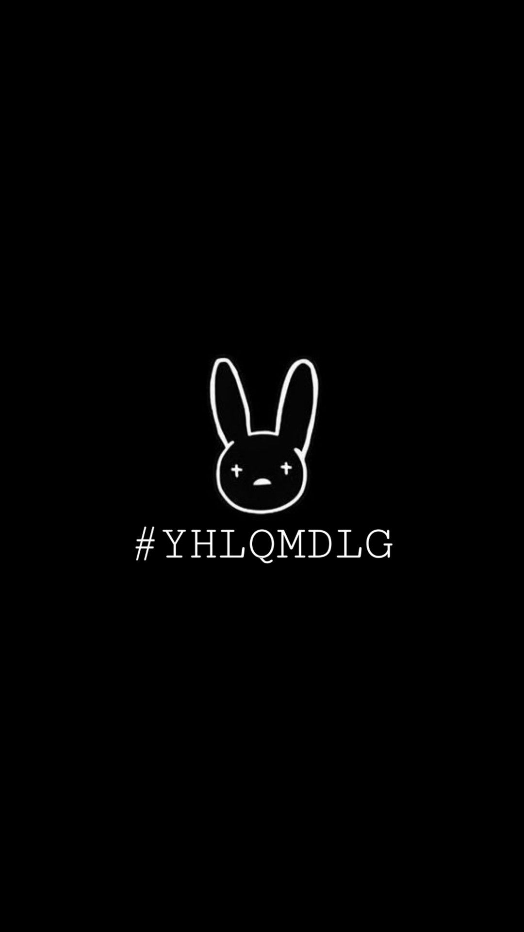 A black background with a white rabbit and the hashtag #YHLQMDLG - Bad Bunny