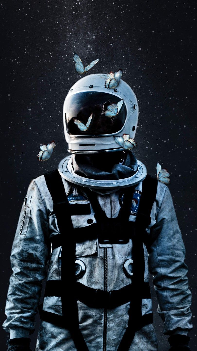 A man in an astronaut suit with birds on his head - Astronaut