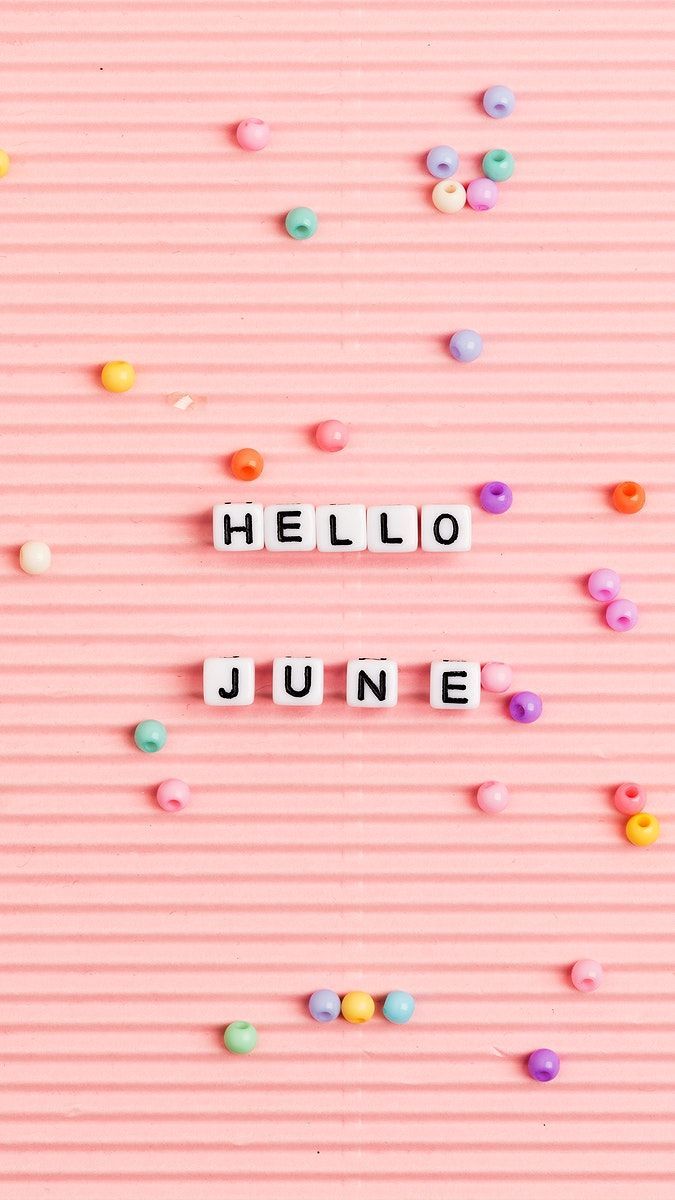 Hello june on a pink background with colorful confetti - June