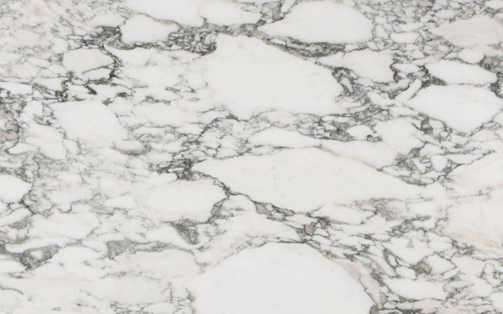 A white marble background with grey veining - Marble
