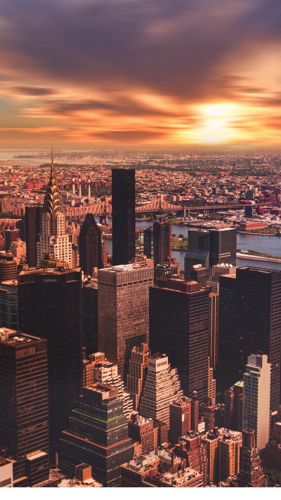 IPhone wallpaper of a cityscape with a sunset in the background - New York, cityscape