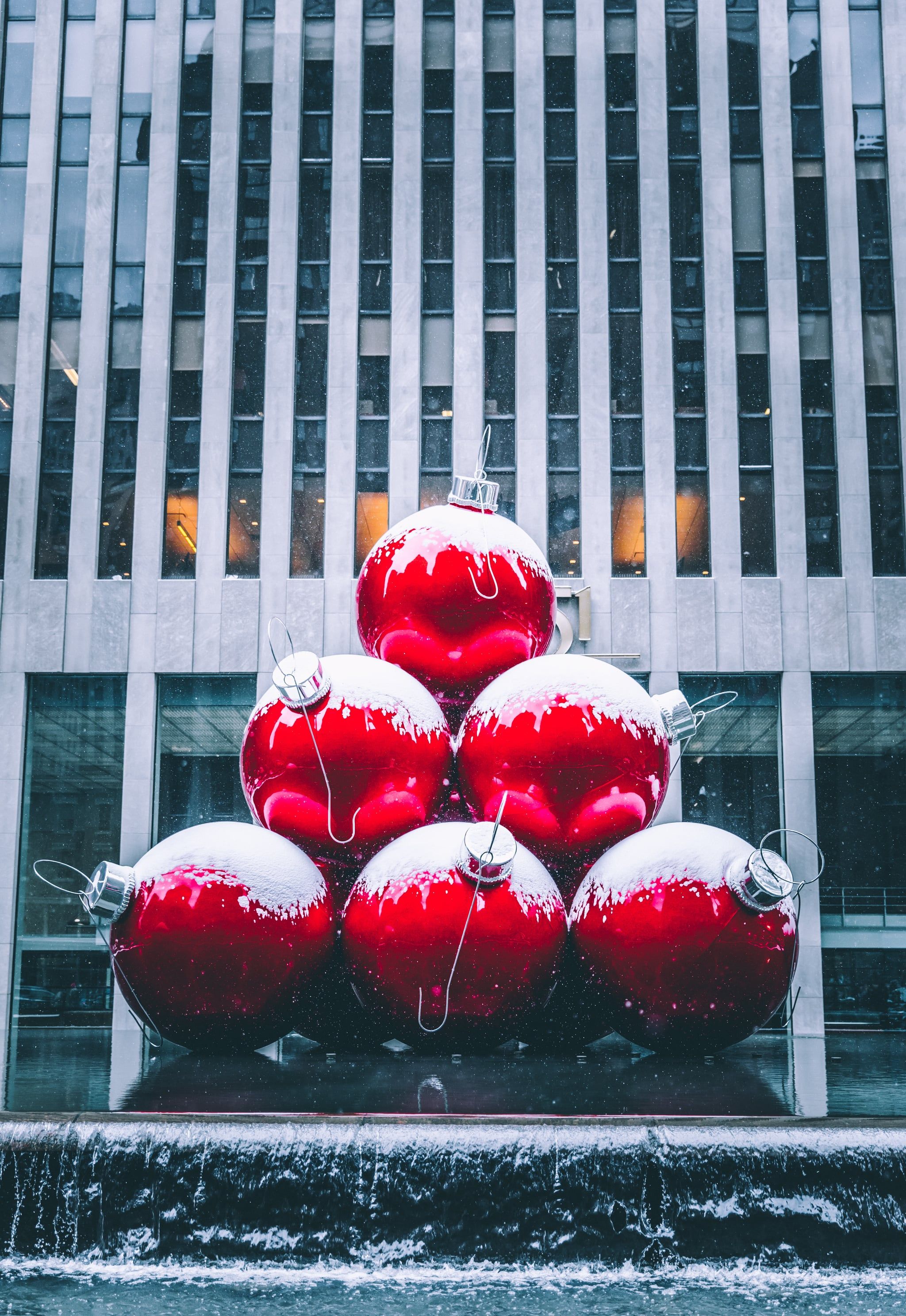 A group of red ornaments in front - New York