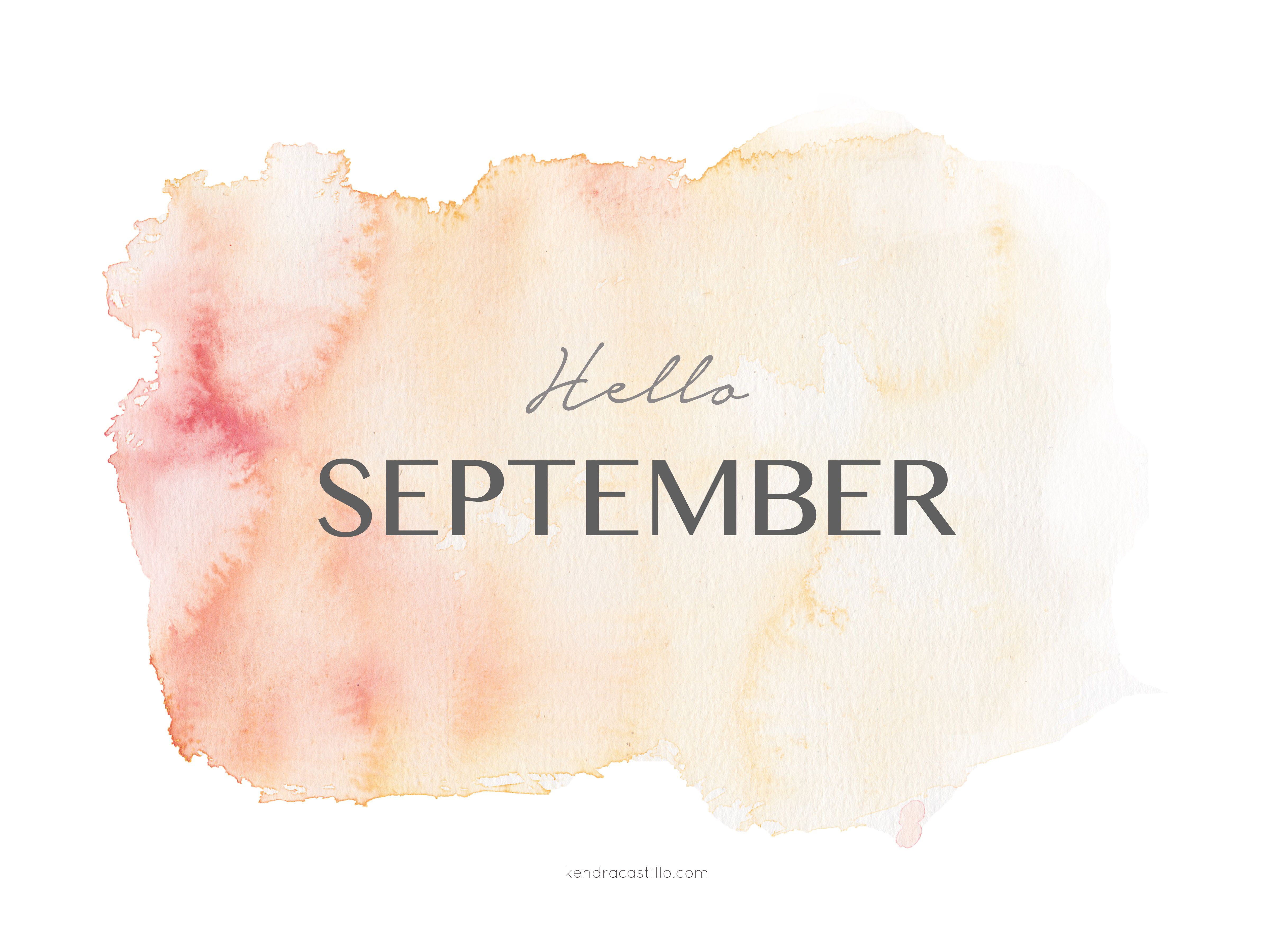 A watercolor background with the word hello september - September