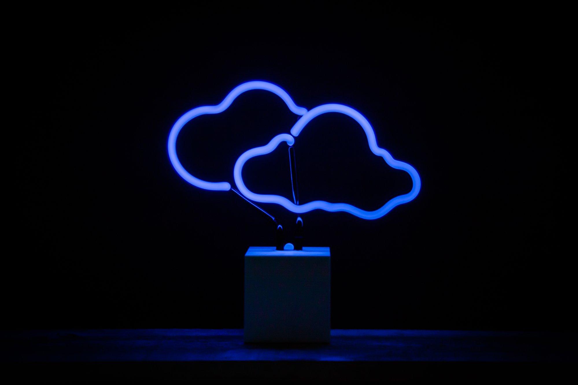 A blue neon light with clouds in it - Neon blue