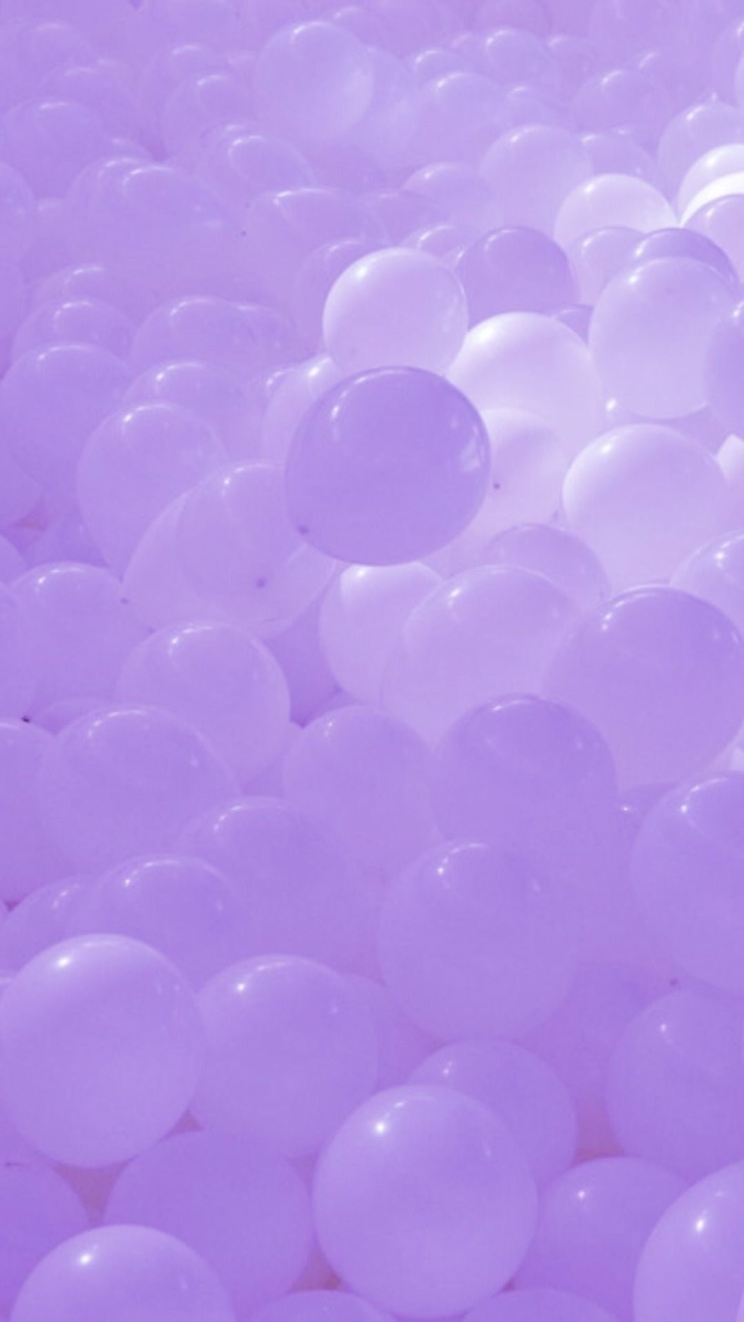 A close up of some purple balloons - Lavender