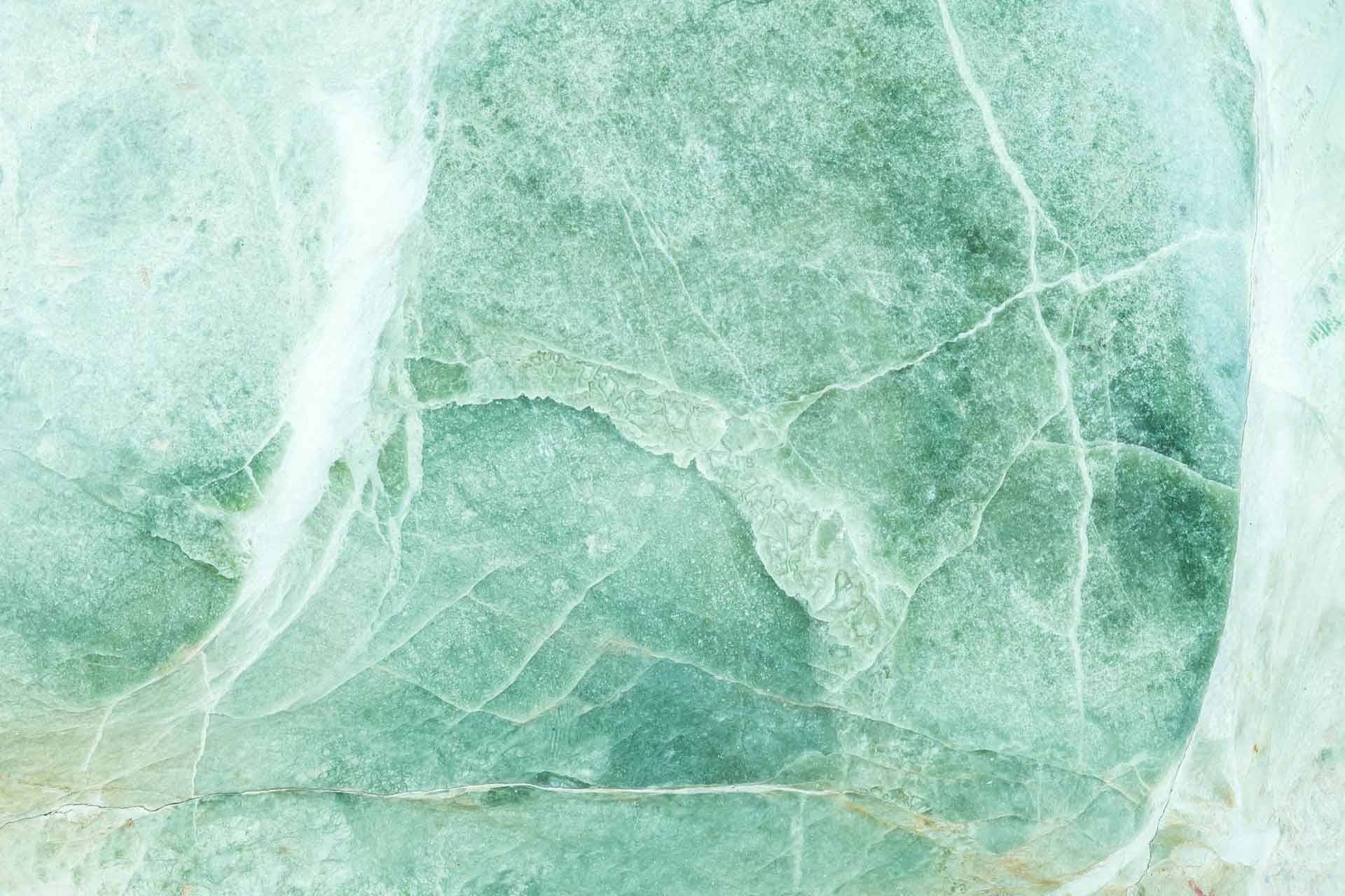A close up of a green marble background - Mint green, pastel green