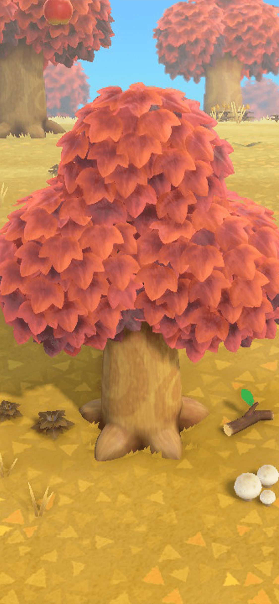 A mushroom with a pink and orange top in a grassy area. - Animal Crossing
