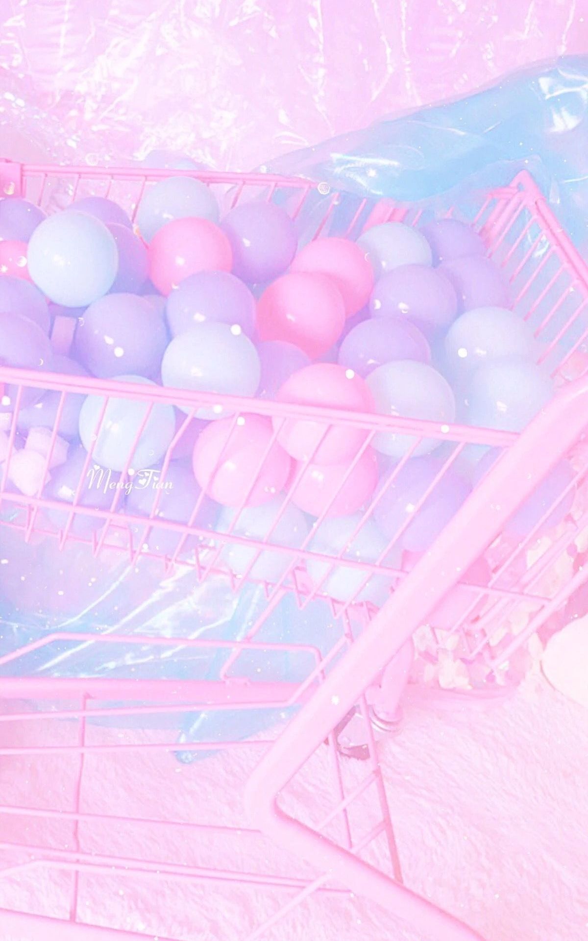 A shopping cart filled with balloons in pink - Pastel purple