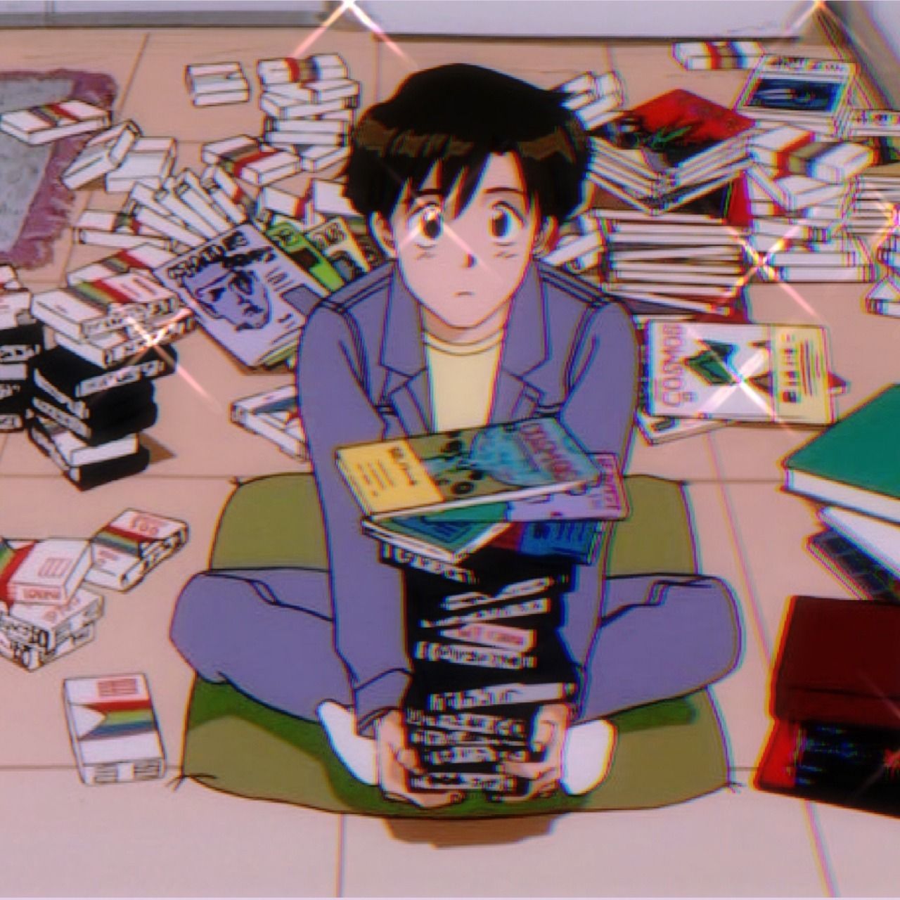 A young man sits cross-legged on the floor, surrounded by piles of books. - 90s anime