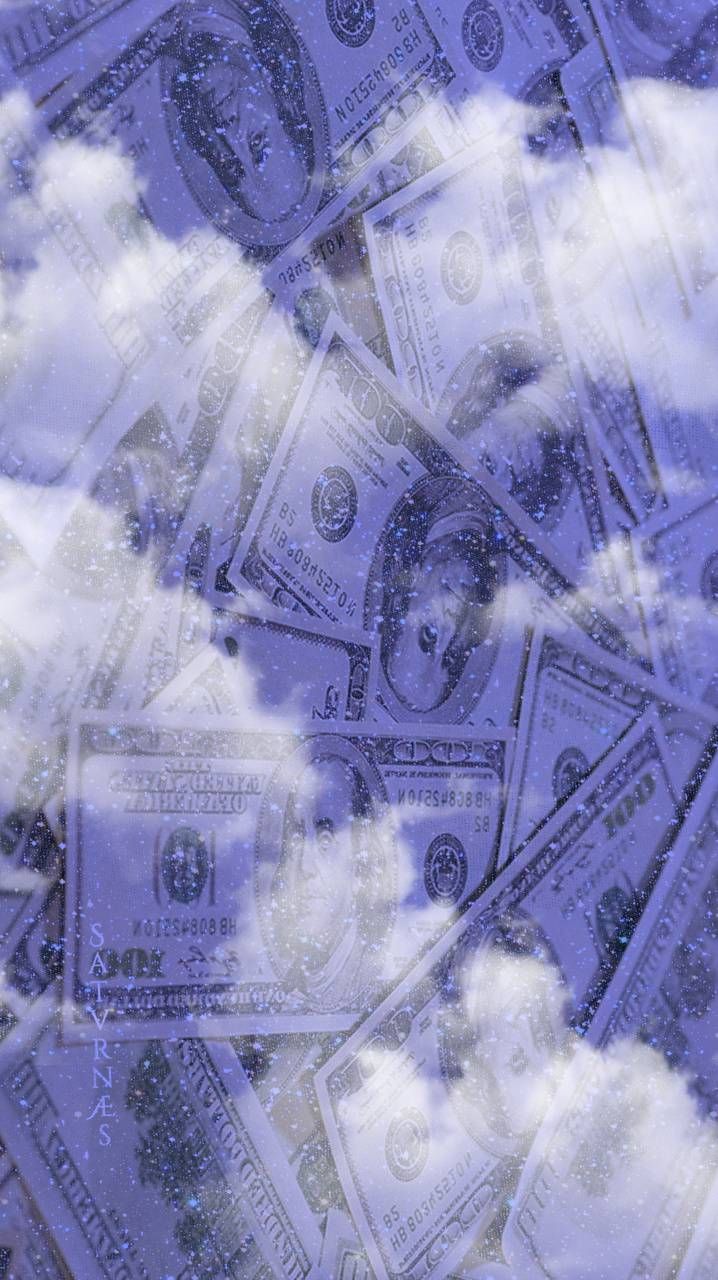 A close up of money floating in the sky - Money