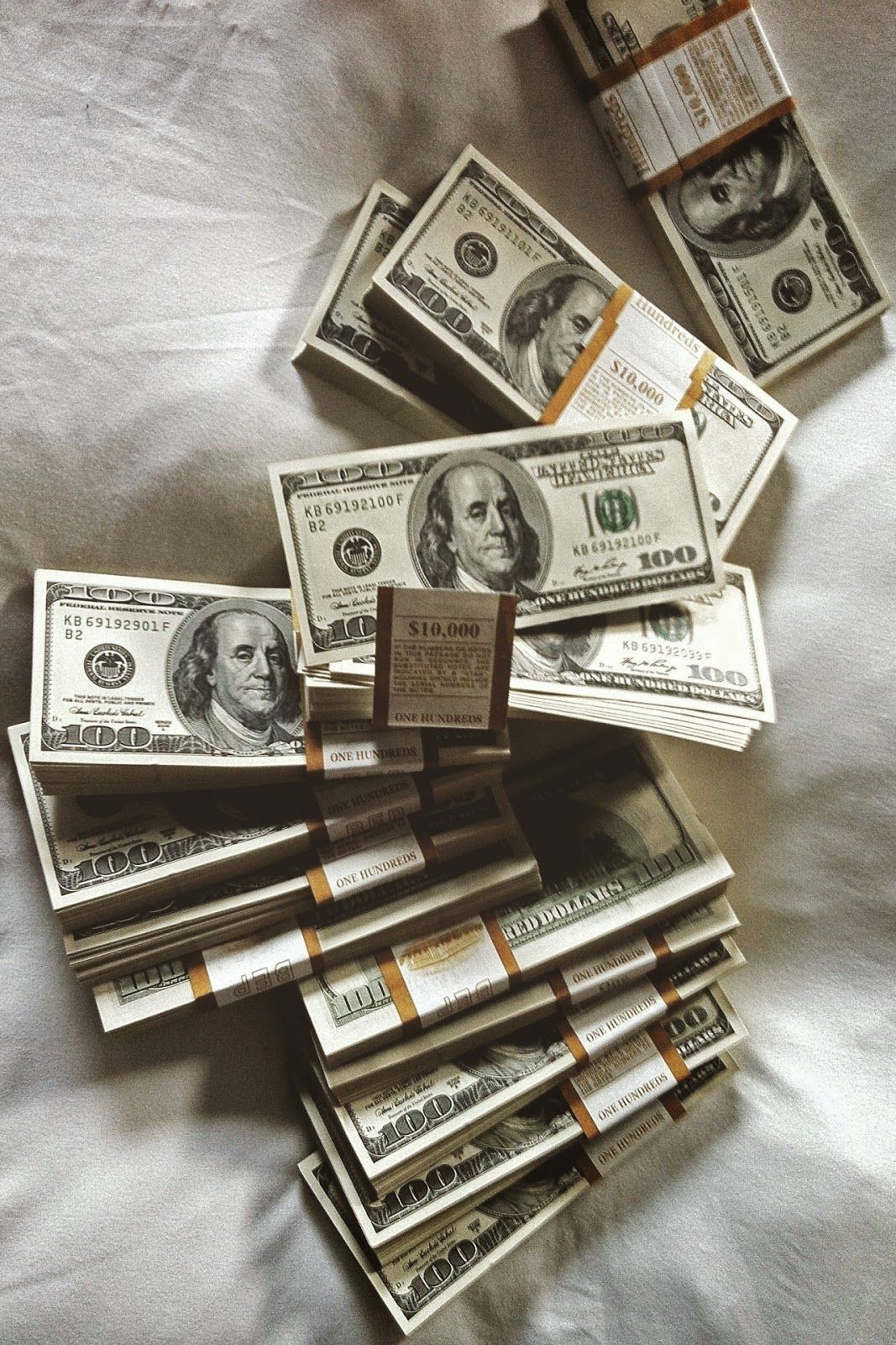 A stack of money on top each other - Money