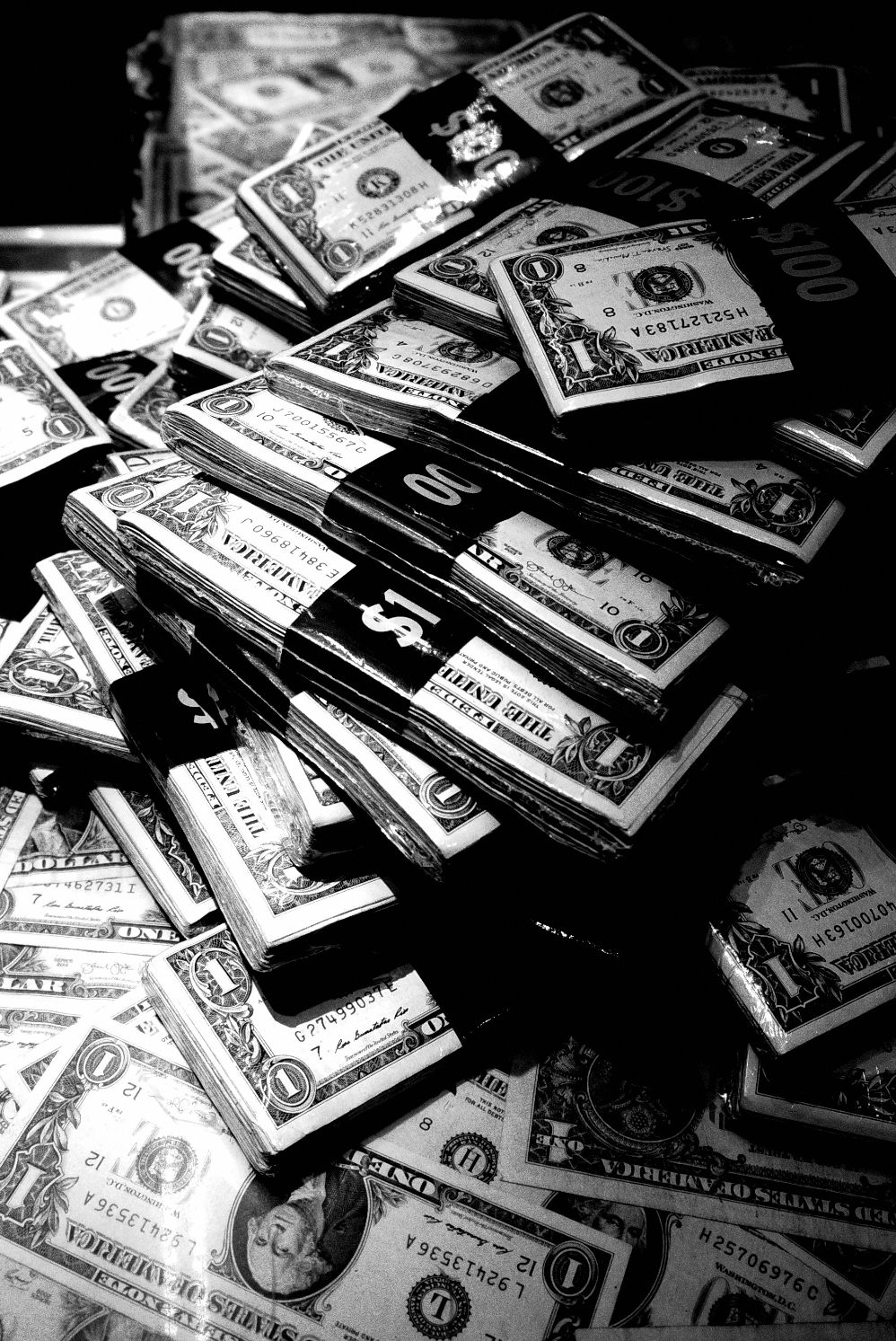 A pile of money on the table - Money